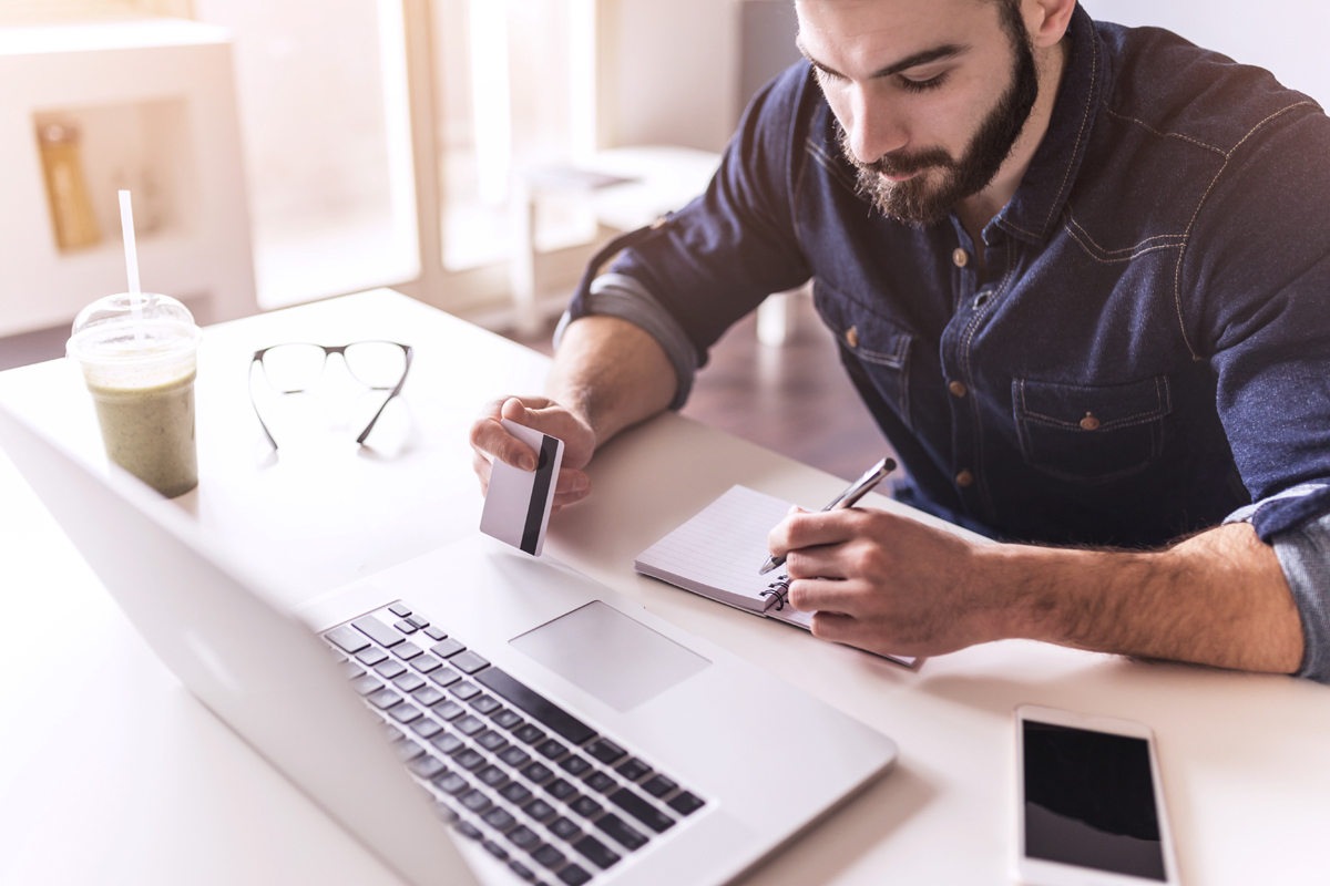 bearded man at computer